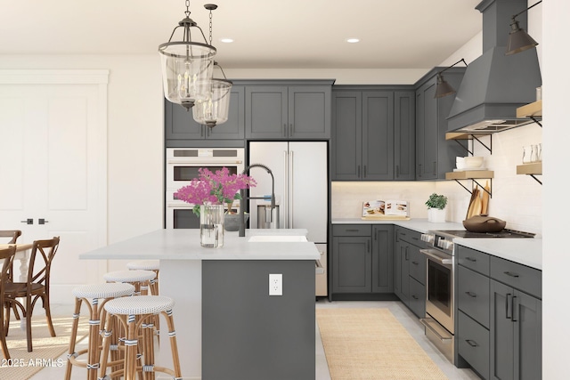 kitchen with gray cabinetry, custom range hood, white appliances, a breakfast bar area, and light countertops