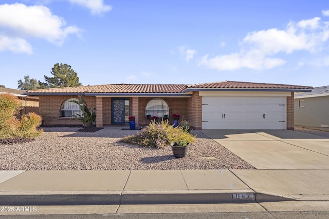 ranch-style house featuring a garage