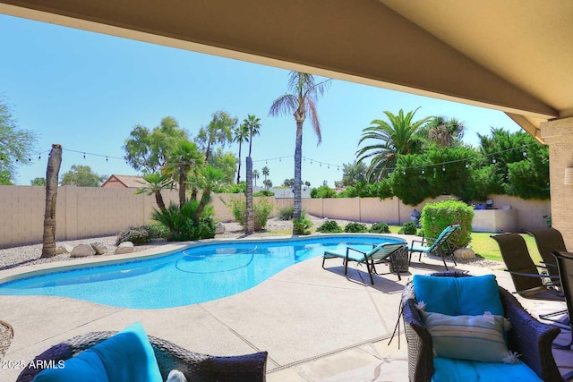 4609 E Monte Cristo Ave, Phoenix, AZ 85032 - view of swimming pool with a fenced backyard, a patio area, and an outdoor living space