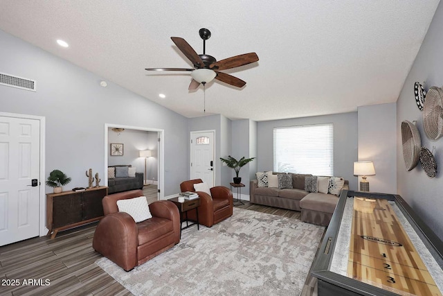 4609 E Monte Cristo Ave, Phoenix, AZ 85032 - living area featuring vaulted ceiling, wood finished floors, a ceiling fan, a textured ceiling, and recessed lighting
