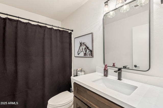 full bath with toilet, visible vents, and vanity