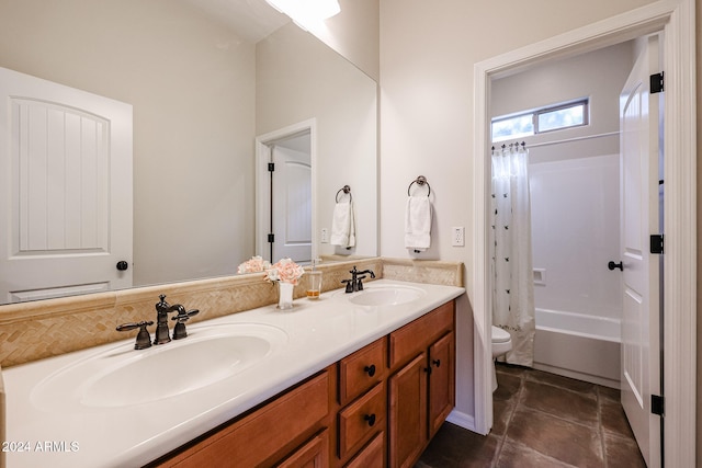 full bathroom featuring toilet, shower / bath combination with curtain, vanity, and tile patterned floors