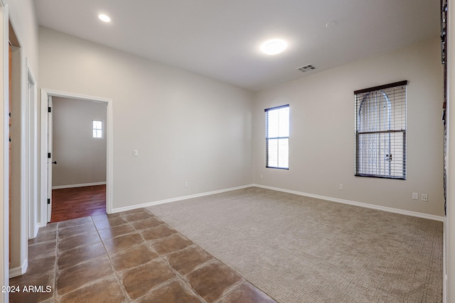 empty room featuring carpet