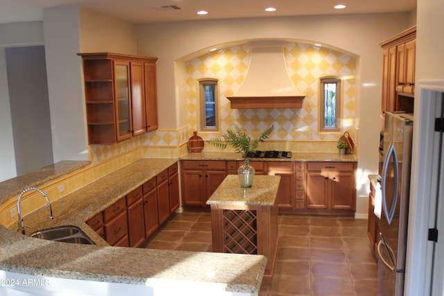 25995 N 85th Dr, Peoria, AZ 85383 - kitchen with a sink, custom exhaust hood, backsplash, black gas stovetop, and recessed lighting