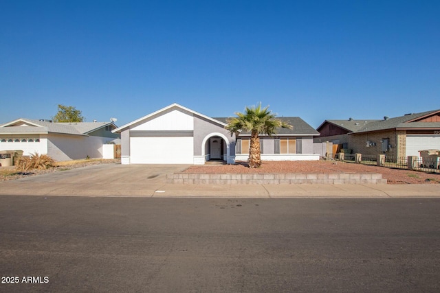 single story home featuring a garage