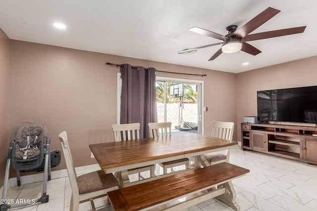 dining area with ceiling fan