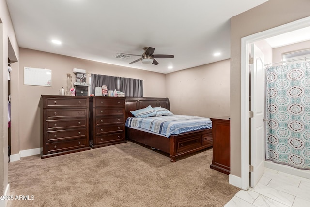 carpeted bedroom with ceiling fan