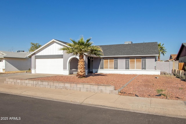 ranch-style home featuring a garage