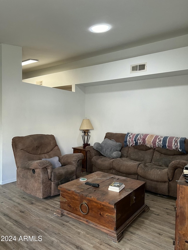 5839 E Norwood St, Mesa, AZ 85215 - living room featuring wood finished floors and visible vents
