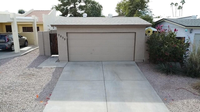 5839 E Norwood St, Mesa, AZ 85215 - garage featuring concrete driveway