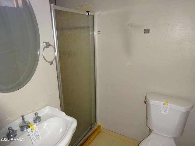 3171 W Orchid Ln, Phoenix, AZ 85051 - full bath featuring a sink, a stall shower, toilet, and tile patterned floors