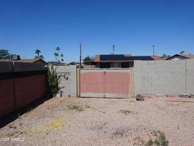 3171 W Orchid Ln, Phoenix, AZ 85051 - view of yard featuring a gate and fence