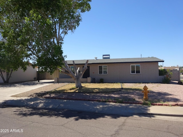 3171 W Orchid Ln, Phoenix, AZ 85051 - single story home featuring brick siding