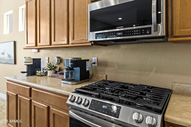 kitchen with appliances with stainless steel finishes