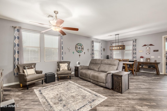 291 N Scott Dr, Chandler, AZ 85225 - living area featuring wood finished floors, visible vents, baseboards, and ceiling fan