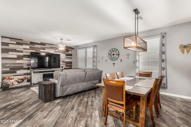 291 N Scott Dr, Chandler, AZ 85225 - dining room with dark wood finished floors, baseboards, visible vents, and an accent wall