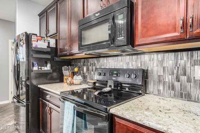 291 N Scott Dr, Chandler, AZ 85225 - kitchen featuring black appliances, decorative backsplash, light stone countertops, and dark brown cabinets