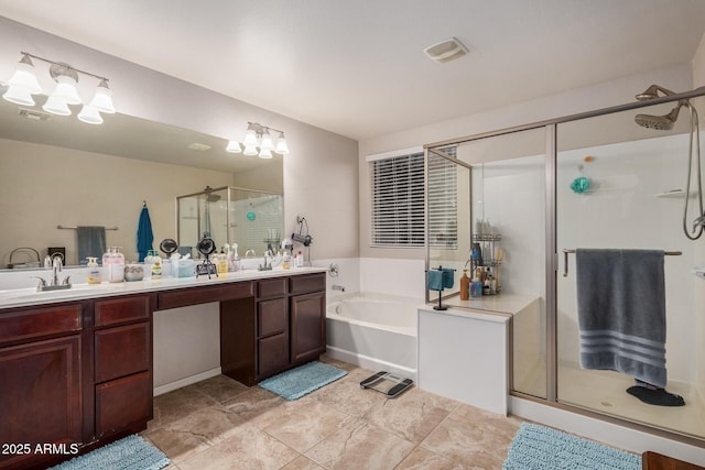 291 N Scott Dr, Chandler, AZ 85225 - full bathroom featuring visible vents, double vanity, a sink, a stall shower, and a garden tub