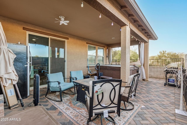 291 N Scott Dr, Chandler, AZ 85225 - view of patio / terrace with outdoor dining space, ceiling fan, fence, and a hot tub