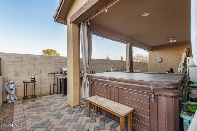 291 N Scott Dr, Chandler, AZ 85225 - view of patio featuring a fenced backyard, a hot tub, and grilling area