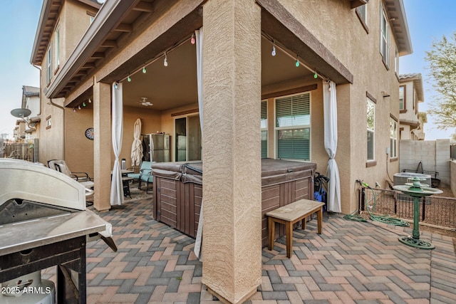 291 N Scott Dr, Chandler, AZ 85225 - view of patio featuring fence and a hot tub