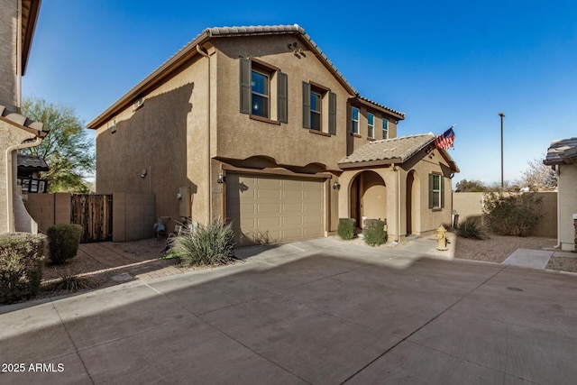 291 N Scott Dr, Chandler, AZ 85225 - mediterranean / spanish-style house featuring a tile roof, driveway, stucco siding, fence, and a garage
