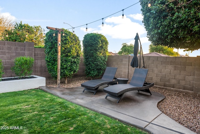 view of patio featuring a fenced backyard