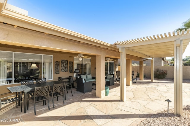 view of patio / terrace with an outdoor living space, a pergola, and ceiling fan