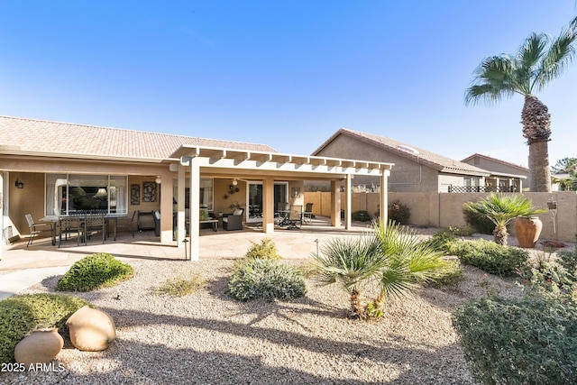 back of property featuring a pergola, an outdoor living space, and a patio