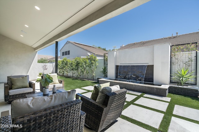 6329 N 10th Dr, Phoenix, AZ 85013 - view of patio / terrace with a fenced backyard and an outdoor living space