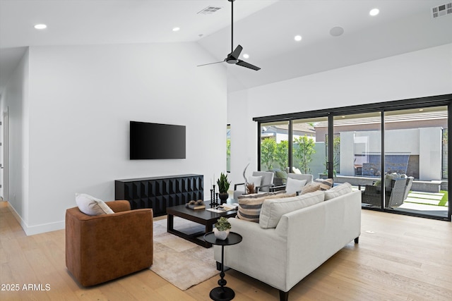6329 N 10th Dr, Phoenix, AZ 85013 - living room featuring light wood finished floors, visible vents, and a ceiling fan