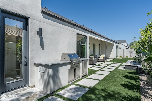 6329 N 10th Dr, Phoenix, AZ 85013 - exterior space with exterior kitchen, fence, and a patio area
