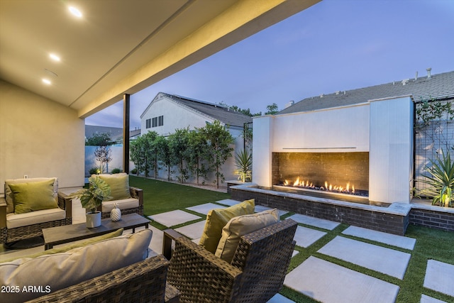 6329 N 10th Dr, Phoenix, AZ 85013 - view of patio featuring an outdoor living space with a fireplace