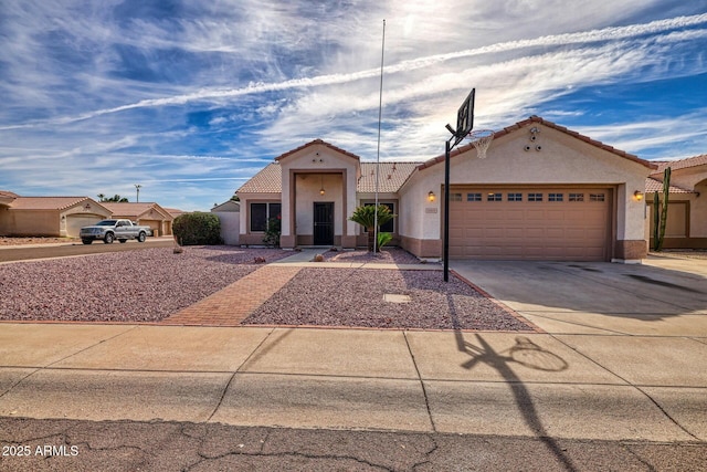 view of front of property with a garage