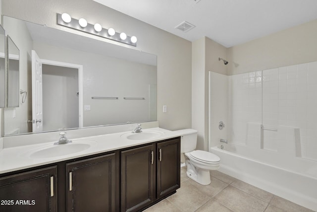 full bathroom with shower / bathtub combination, vanity, toilet, and tile patterned flooring