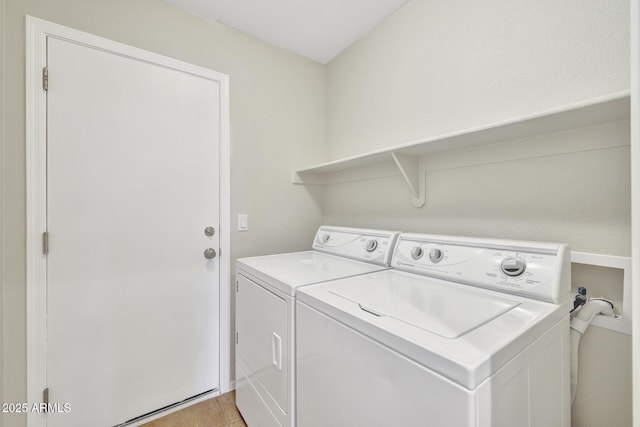 laundry area featuring washing machine and dryer