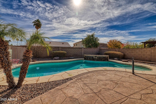 view of pool featuring a patio