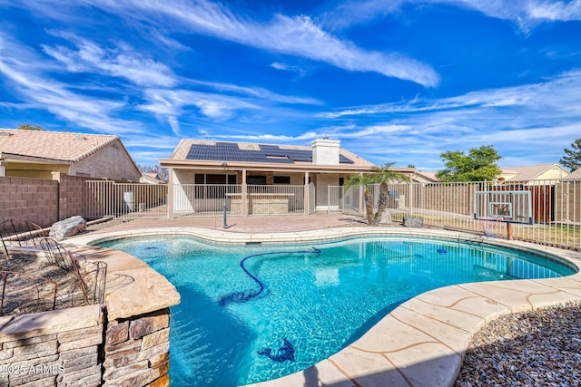 view of swimming pool with a patio