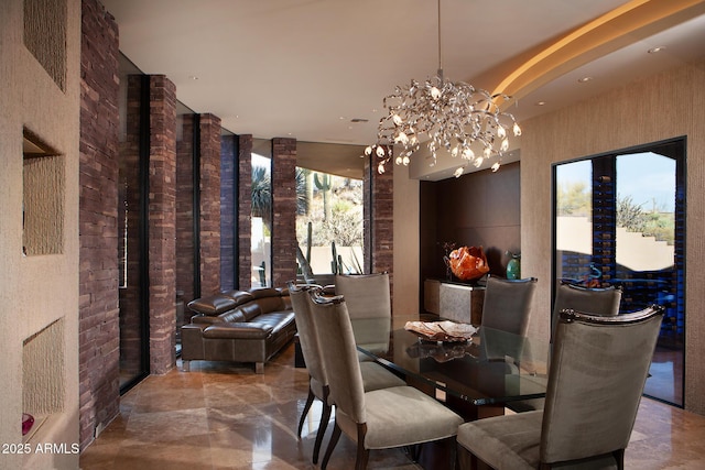 dining area with a notable chandelier