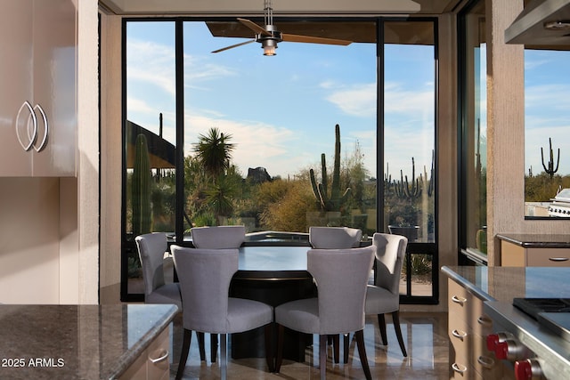 dining area featuring ceiling fan