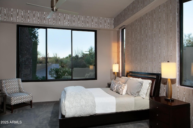 carpeted bedroom featuring ceiling fan