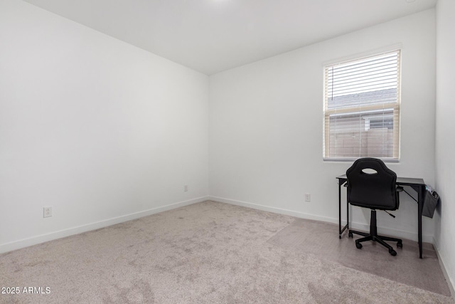 home office with carpet flooring and baseboards