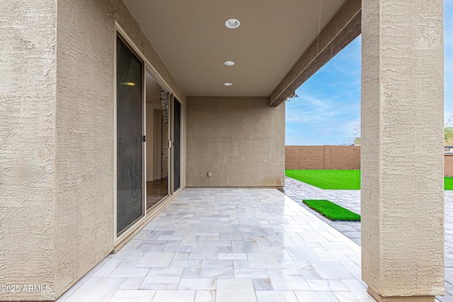 view of patio / terrace with fence