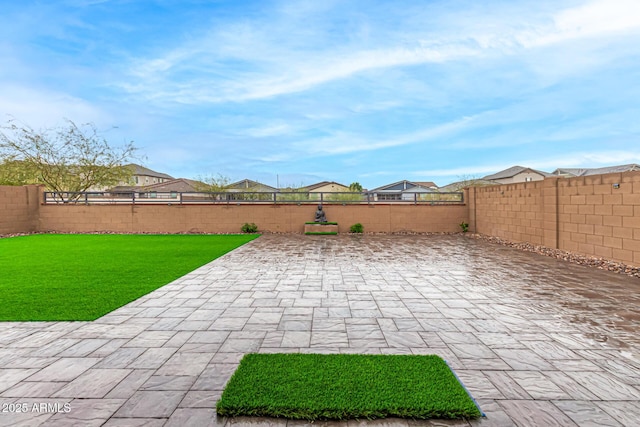 view of patio featuring a fenced backyard