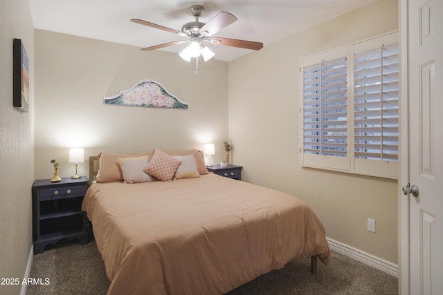 bedroom featuring carpet, baseboards, and a ceiling fan