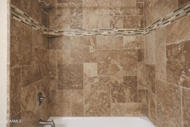 bathroom view of shower / bath combination