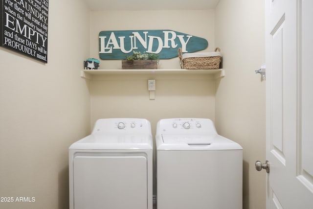 washroom with independent washer and dryer