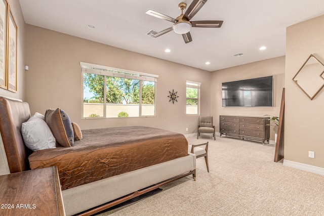 carpeted bedroom with ceiling fan