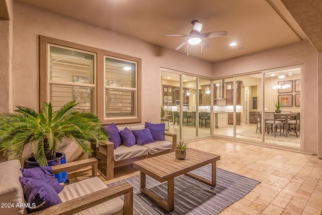 view of patio featuring outdoor lounge area and ceiling fan