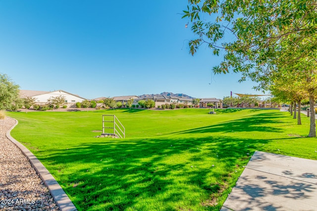 surrounding community with a lawn